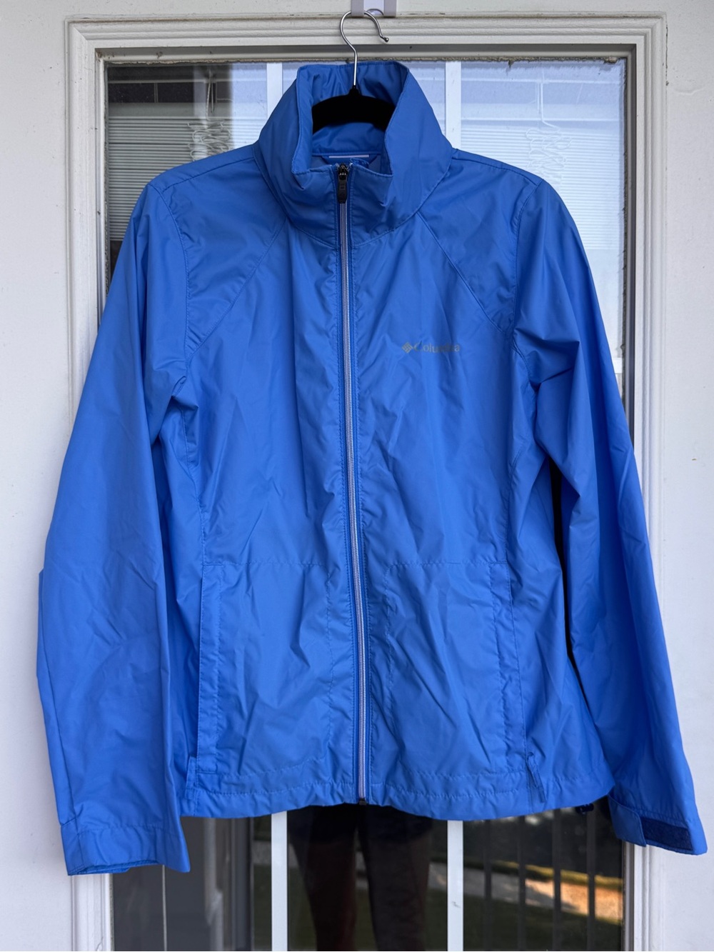 Columbia Women’s Lightweight Rain Jacket with Stowaway Hood – Size M